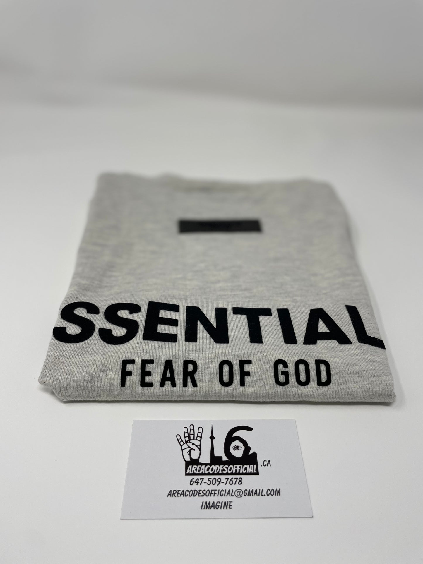 Fear Of God Essentials LIght Oatmeal Kids T-Shirt (SS22)