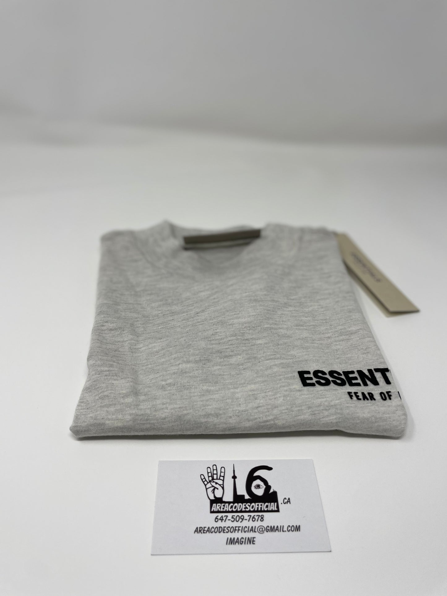 Fear Of God Essentials LIght Oatmeal Kids T-Shirt (SS22)